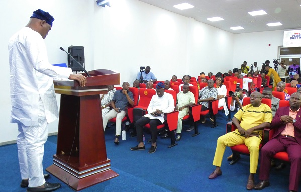 Mustapha Ussif (right), Minister for youth and sports addressing the press.